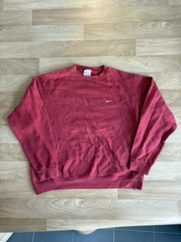 Vintage Nike crewneck — creased pull-out shot vs. flat-lay, straightened and centred. — after